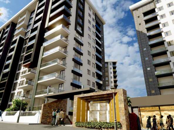 A group of tall buildings Description automatically generated